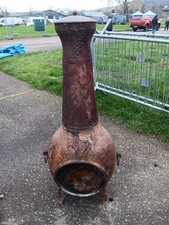 large cast iron chiminea, fire