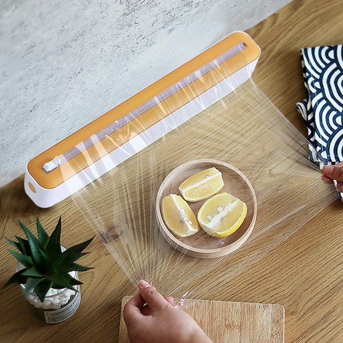 Cling film dispenser - in,