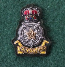 The Yorkshire Volunteers Officer's Beret badge - Dark Green Background