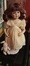 Large Porcelain Doll By The