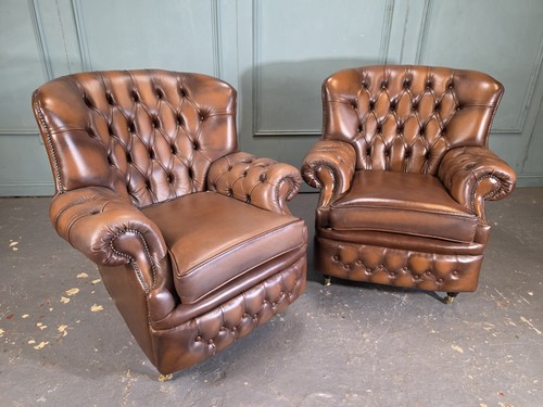 Pair brown leather arm - of,