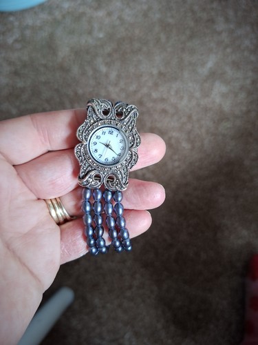 Marcasite and pearl watch - and,