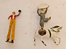 Britain Ltd. Circus Clown On Horse and Circus Clown on Stilts