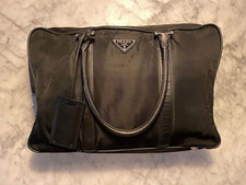 Prada men's nylon bag with leather handles and metal padlock 