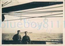 Post war photo British Army soldiers on ship deck with ship in background 3x2.2"
