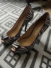 Unique - Zebra design high heels shoes size 39. Immaculate condition!!