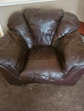 2 x brown leather armchairs