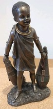 Bronze Tone Figurine Jinaki