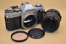 Vintage Canon AE1 SLR 35mm Film Camera with Zoom Lens 1037878