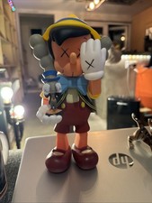 Kaws Pinocchio and Jiminy Cricket Figures Medicom Toy Disney