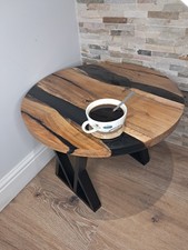 Oak river resin coffee table. Smokey black