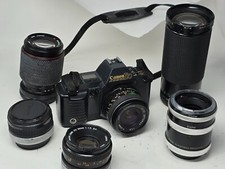 Vintage Canon T70 Film SLR Camera With 50mm Prime, 28mm & 35-300mm 70-210mm lens
