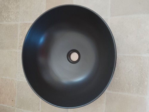 Round black countertop basin
