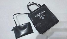 PRADA Mesh Triangle Logo Plate