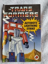 The Transformers Autobots' Lightning Strike (Hardback, 1985). Ladybird Book