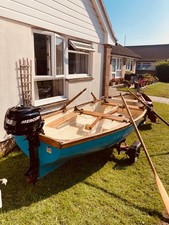 Day/fishing boat with serviced engine & trailer