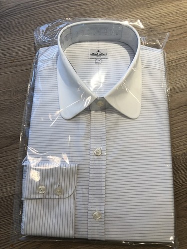 White with thin black - , stripe