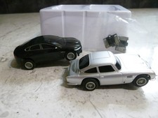 MICRO SCALEXTRIC 007 ASTON MARTIN DB5 & JAGUAR XF WITH SPARE BRUSHES VGC WORKING