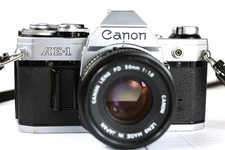 Canon AE-1 SLR 35mm Camera Good Working with FD 50mm Prim Lens