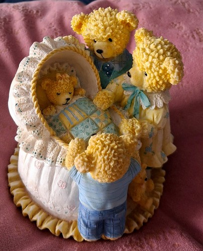 Avon lovable teddies displayed - teddies,