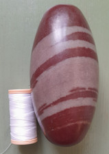 4.25 inch Shiva lingam stone. Weight is 390g