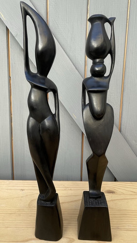 Pair abstract carved wooden - of,