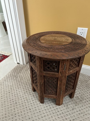 Inlaid with metal hand carved