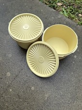 2 VINTAGE TUPPERWARE YELLOW ROUND STORAGE CONTAINERS