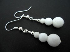 A PAIR OF PRETTY WHITE JADE