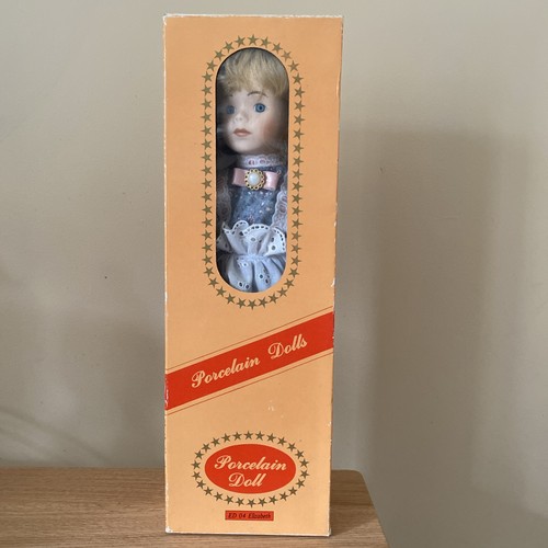 Porcelain doll box - doll,