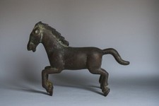A Chinese Bronze figure of a horse in the Tang style.