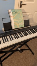 Casio CDP-S110 digital weighted piano + piano stand + Adult Piano Adventures