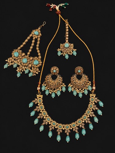 Women gold tone kundan - tone,