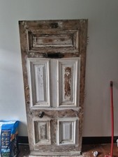1890s Victorian Front Door with original cast iron details.  91.5 W 212.8 L