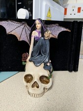 Gorgeous Gothic Fairy Sitting On A Skull By Mystic Legends.