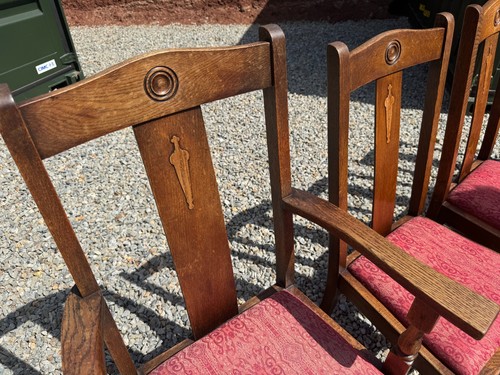 Six oak dining chairs