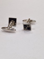 Stylised Cufflinks Only Suitable for Millionaires, made from real diamonds.. NOT