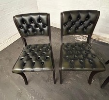 A pair of chesterfield dining/occasional chairs in Antique green leather 