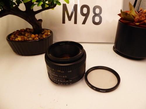 Nikon 50mm d auto - f/1.8,