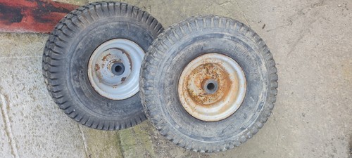 Pair ride mower wheels - on,