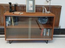 Mid century teak sideboard/media stand with sliding glass doors/adjustable shelf