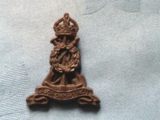WW2. The Labour Corp economy issue plastic cap badge.