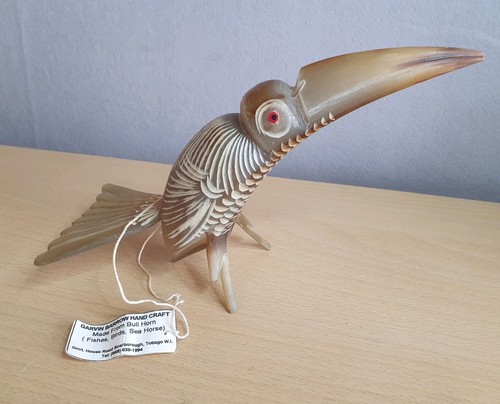 Hand carved bull horn bird - hand,