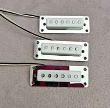 three guitar pick ups, single