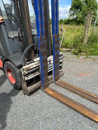 Forklift positioner toes - forklift,