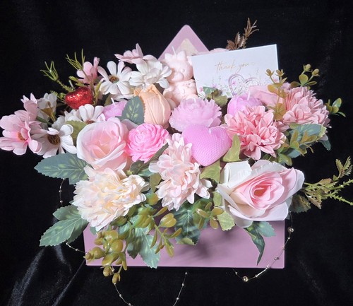 Flowers and candles bouquet