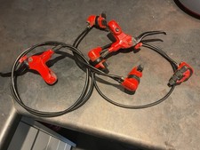 Maura HS33 Hydraulic Rim Brake Set Red And Black With Quick Release Mounts