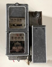 Coin operated electric meter