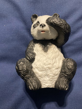 Giant Panda Covering Eye