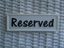 Reserved sign plaque wall